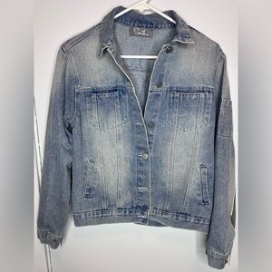 Light blue denim jacket with silver tone fringe detail